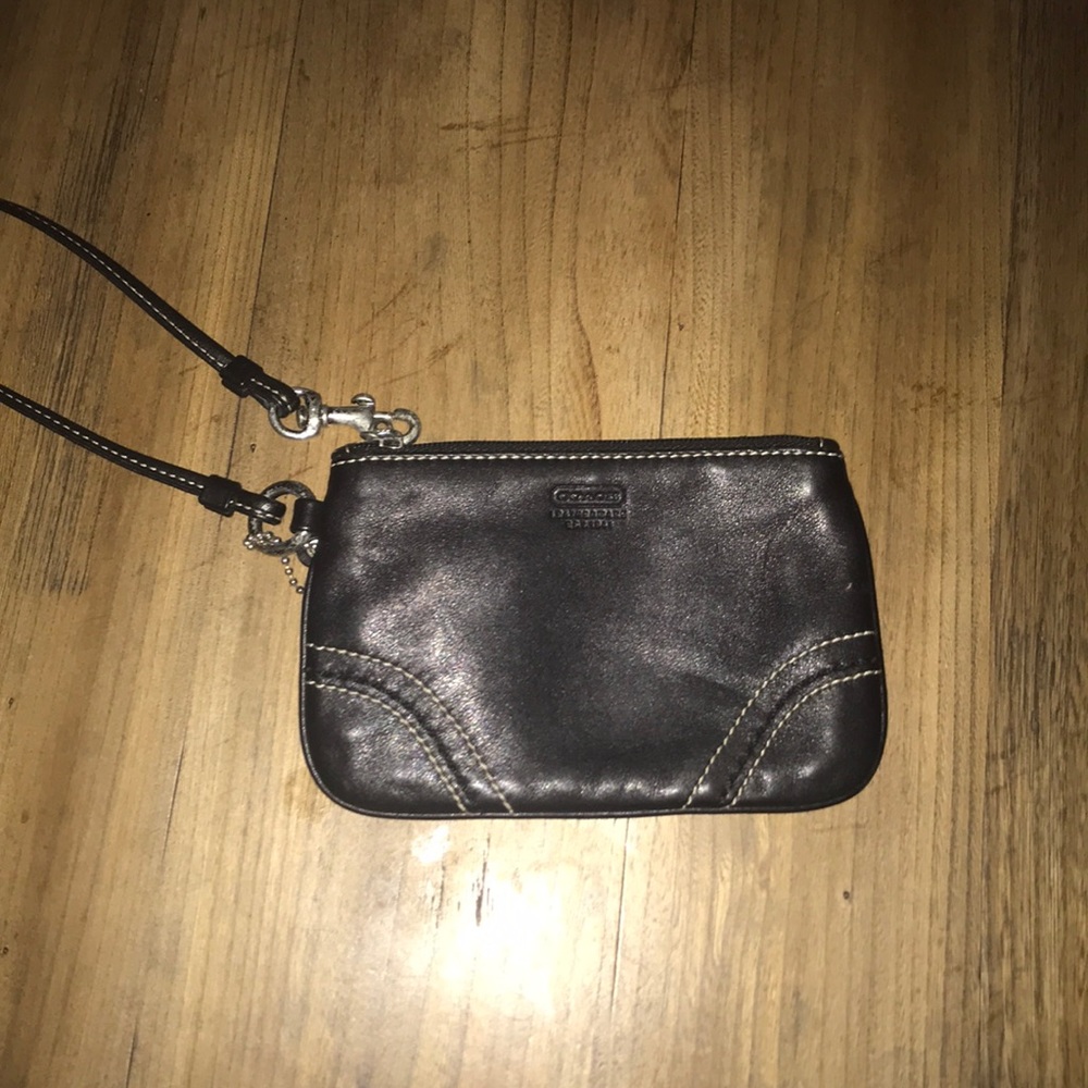 Black coach wristlet great condition.